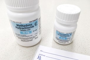 A stock photo of a methadone bottle