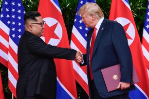 Kim Jong Un, left, and Donald Trump after denuclearization talks