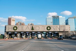 The entrance to the Holland Tunnel where the Christmas tree decoration was placed over the N instead of the A.