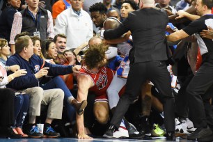 Thunder forward Jerami Grant and Bulls center Robin Lopez scuffle in the second half of Monday's game.