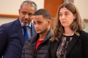 Nilson Castillo with his lawyers in Bronx Supreme Court.