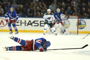 Mats Zuccarello, who is on the trading block, falls to the ice during the Rangers' 4-1 loss to the Wild on Thursday night.