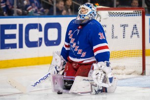 Henrik Lundqvist reacts after giving up a goal against the Red Wings on March 19, 2019.