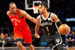 D'Angelo Russell, who scored 27 points, drives to the basket during the Nets' 115-105 loss to the Raptors on Wednesday.