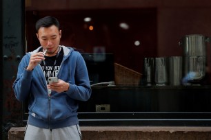 A man smokes an e-cigarette in New York.