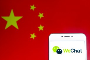 In this photo illustration a Chinese multi-purpose messaging, social media and mobile payment app developed by Tencent, WeChat.