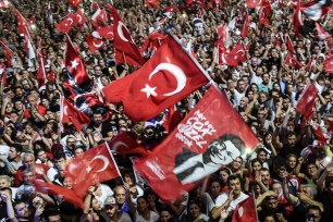 People celebrate the victory of mayoral candidate Ekrem Imamoglu in Istanbul.