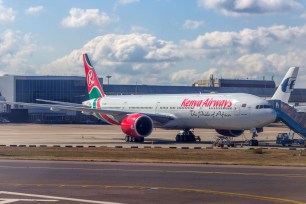 A Kenya Airways airplane arrives at London Heathrow Airport.