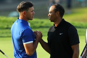 Brooks Koepka and Tiger Woods
