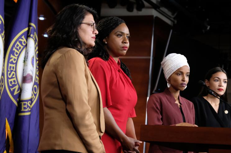 US Rep. Rashida Tlaib (D-MI), Rep. Ayanna Pressley (D-MA), Rep. Ilhan Omar (D-MN) and Rep. Alexandria Ocasio-Cortez (D-NY) pause between answering questions during a press conference.