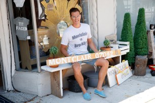 Four years ago, Zachary Tischbein opened his shop One Table Leg, which stocks what Tischbein calls “Montclair sassy items” — including a shirt that says "Montclair vs. Brooklyn" and a wooden sign bearing the town's ZIP code.