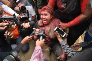 Mayor Patricia Arce after being attacked by a mob of protesters in Vinto, Bolivia.