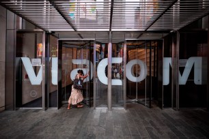 A woman enters the Viacom company headquarters in New York City