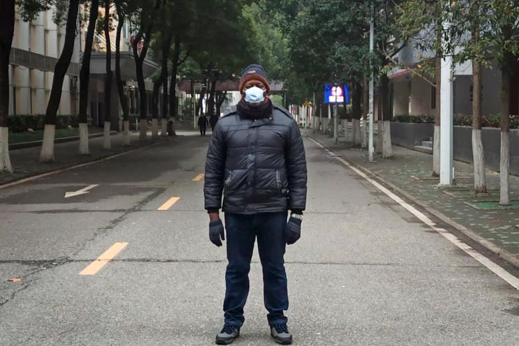 Dr. Khamis Hassan Bakari of Tanzania, poses for a photo in Wuhan, China.