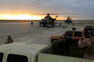 Helicopters outside the Ain al-Asad airbase