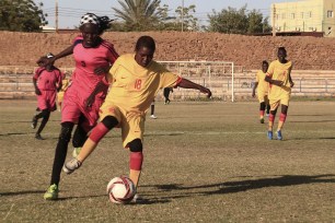 Sudanese al-Difaa, in yellow, and al-Sumood women teams play in Omdurman, Khartoum's twin city, Sudan.