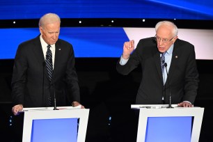 Democratic presidential hopefuls Former Vice President Joe Biden (L) and Vermont Senator Bernie Sanders (R)