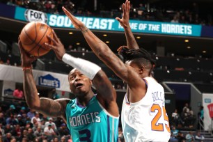 Terry Rozier drives on Reggie Bullock during the Knicks' 97-92 loss to the Hornets on Tuesday night.