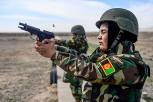 Afghan National Army soldiers take part in a military exercise.