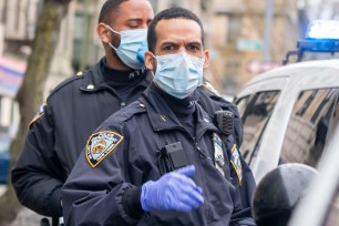 NYPD officers wearing masks on the job in the Bronx