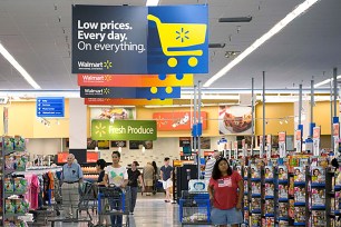 Shoppers in an aisle in Walmart