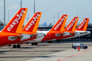 EasyJet aircrafts parked at an empty Schiphol Airport in the Netherlands.