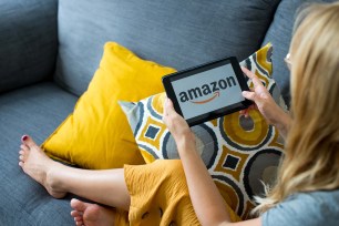 Woman using Amazon Fire tablet