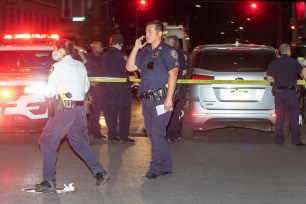 Police at the scene where four people were shot in Brownsville, Brooklyn.
