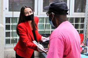 Alexandria Ocasio-Cortez attempts good social distancing while meeting subway riders at the Parkchester 6 line in the Bronx, as she gets back to the campaign trail in hopes of a securing her re-election.