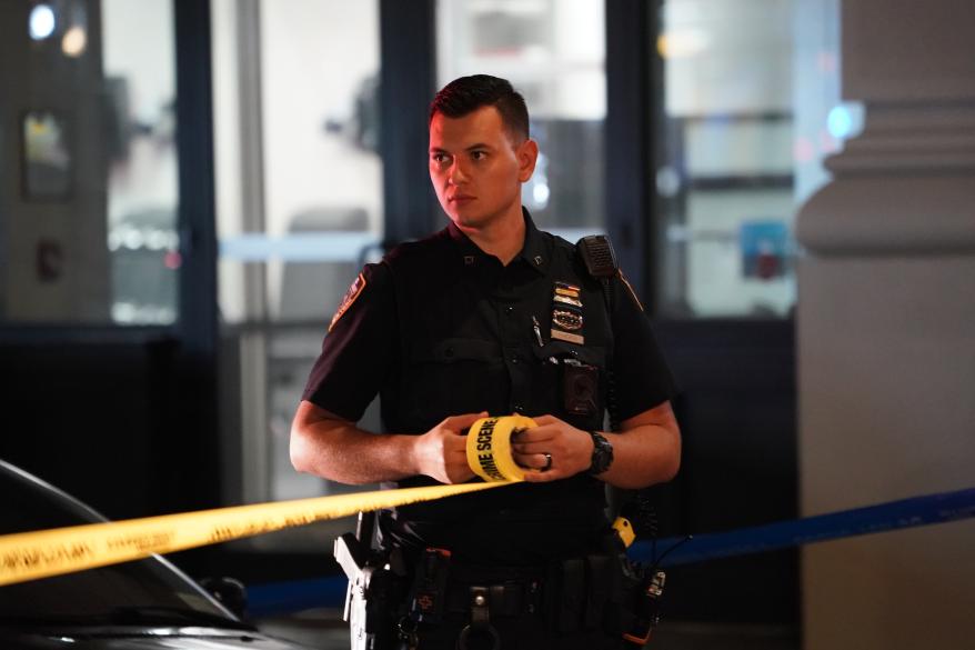 Police at the scene where two people were shot on Fifth Avenue and East 26th Street