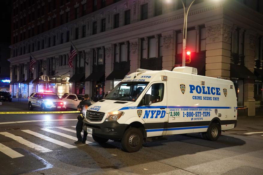 Police at the scene where two people were shot on Fifth Avenue at East 26th Street