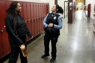 Darnella Frazier, left, chatted with school resource officer Drea Leal at Roosevelt High School in Minneapolis in 2019.