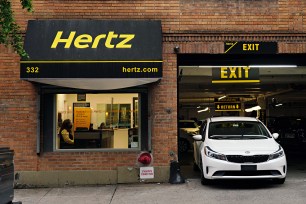 An exterior view of a Hertz Car Rental in New York.