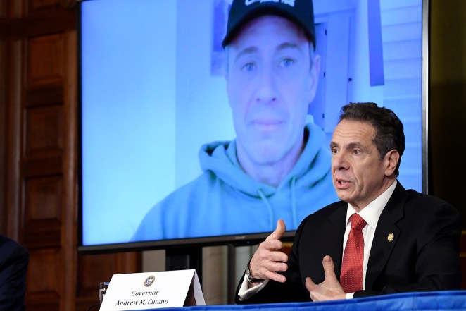 Gov. Andrew Cuomo speaks to his brother Chris Cuomo during a news conference on April 2.