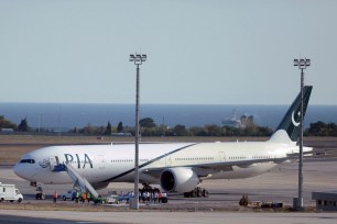 A Pakistan International Airlines plane sits on the tarmac at Ataturk Airport in Istanbul, Turkey.