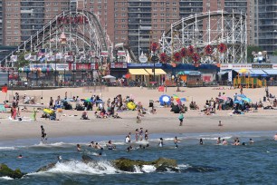 Beachgoers at Coney Island beach, Brooklyn.