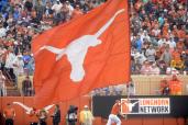 Texas football 13 players coronavirus