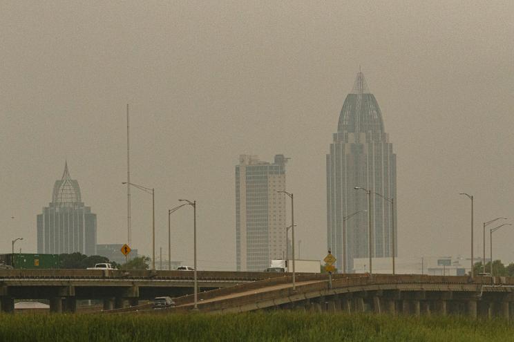 he skyline is covered in haze from the arrival of the Sahara Dust Cloud, in Mobile, Alabama.