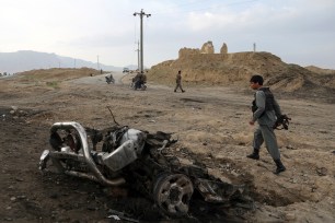 A member of the Afghan security force at the site of a suicide attack in Apirl.