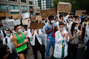 Medical professionals join a George Floyd protest rally at Union Square in Manhattan last Friday.
