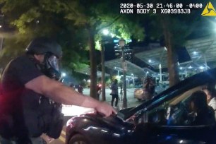 Body camera footage showed six officers breaking the windows of a car and yanking the students, Taniyah Pilgrim, 20, and Messiah Young, 22, as they were returning home from George Floyd protests.