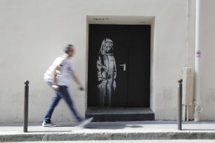 Banksy's original Paris Bataclan piece, memorializing the 90 people who were killed at the concert hall in a terrorist attack on Nov. 13, 2015.