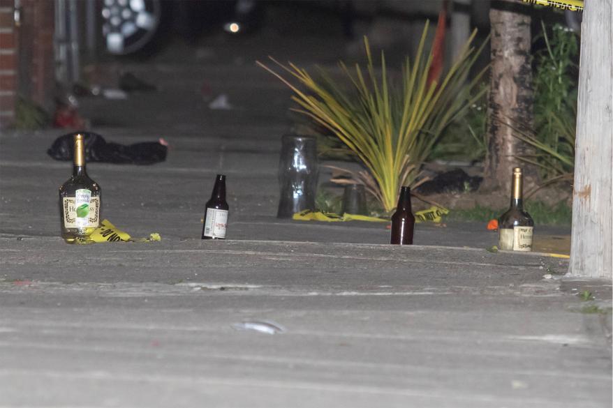 Bottles used by the police to mark shells at the shooting in Brownsville.