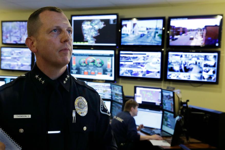 Chief Scott Thomson watches one of the live video monitors in the command center of Camden County Metro police in Camden, New Jersey