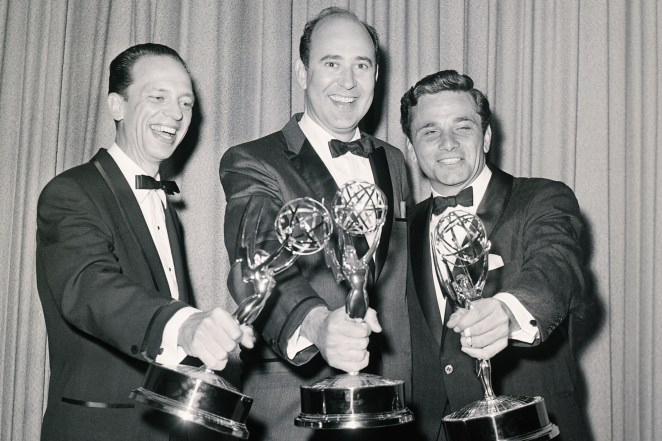 Three Emmy winners, (from left to right) Don Knotts, Carl Reiner, and Peter Falk, hold their awards at the 1962 Awards.
