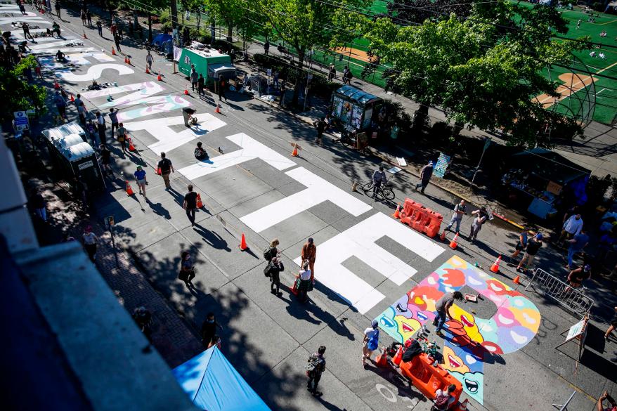 "Black Lives Matter" painted in the middle of East Pine Street in the newly created Capitol Hill Autonomous Zone (CHAZ) in Seattle, Washington.