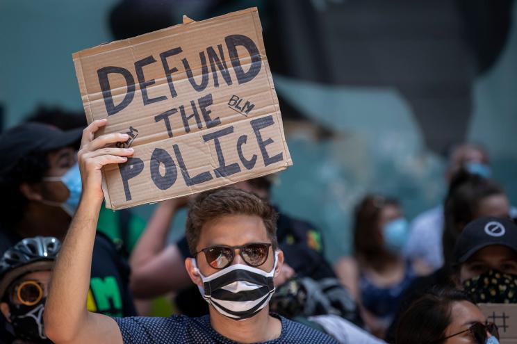 Defund the police protester