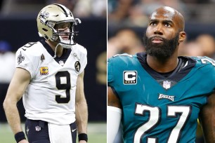 Drew Brees (l) and Malcolm Jenkins