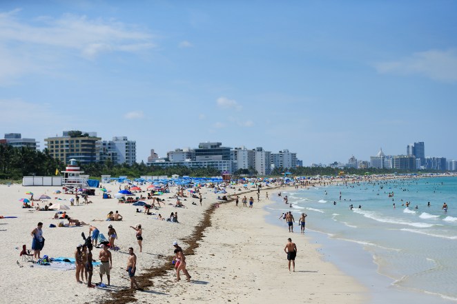 Beachgoers take advantage of the opening of South Beach on June 10.