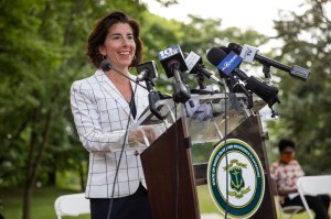 Rhode Island Gov. Gina Raimondo speaks at a news conference announcing her executive order.